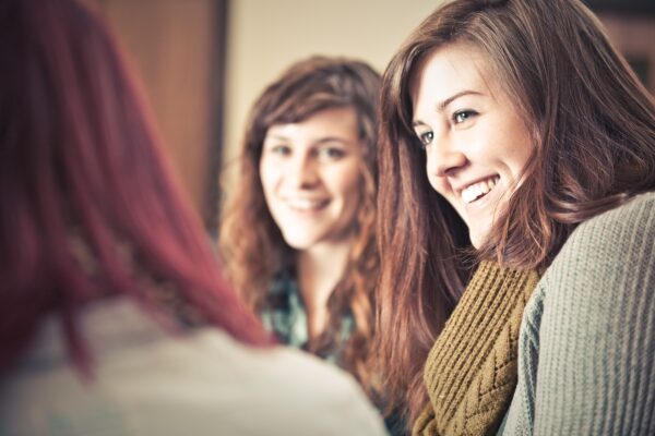 Group of young women smiling at a bible study 5616x3744